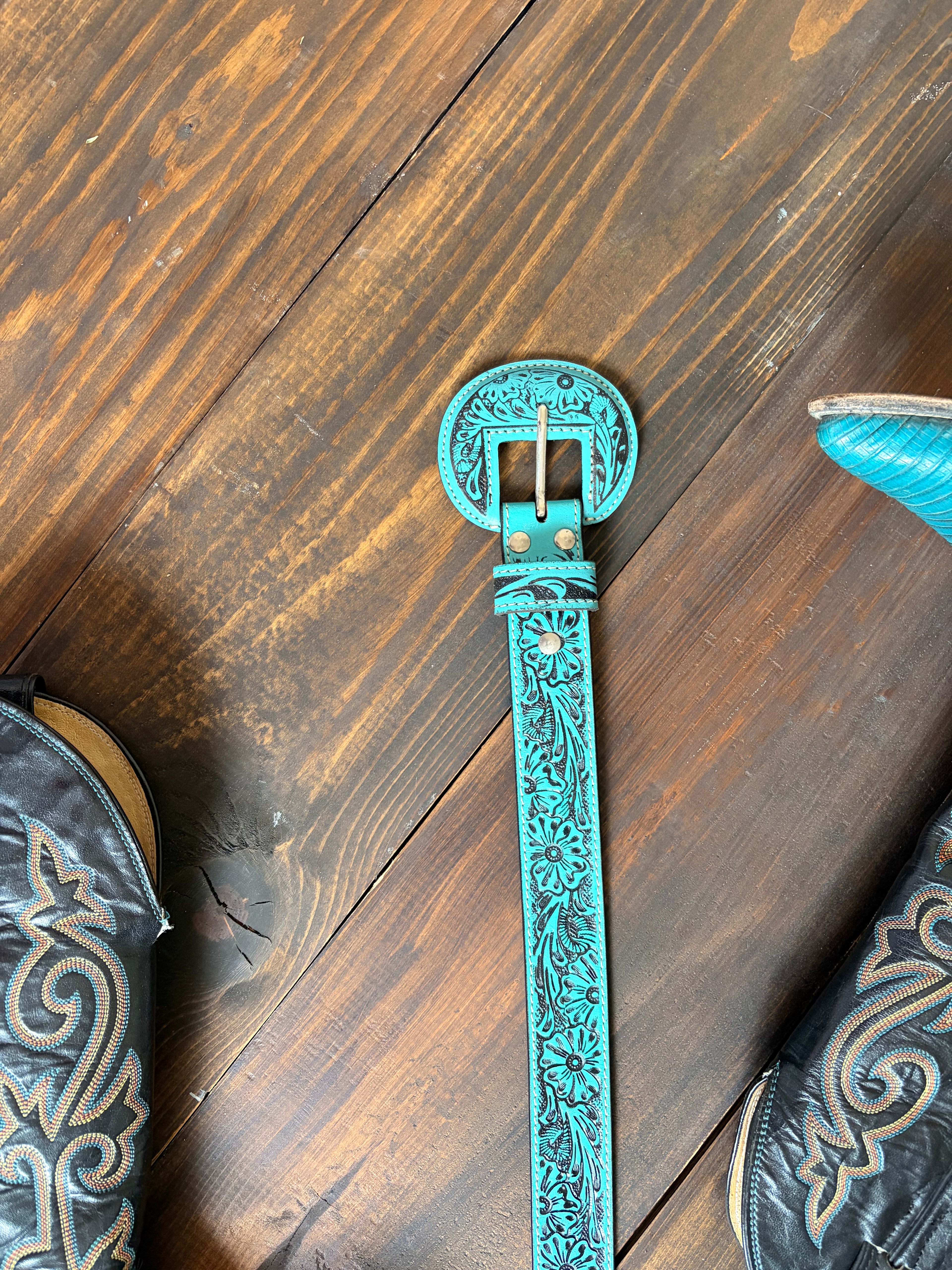 The saddle ridge tooled leather belt