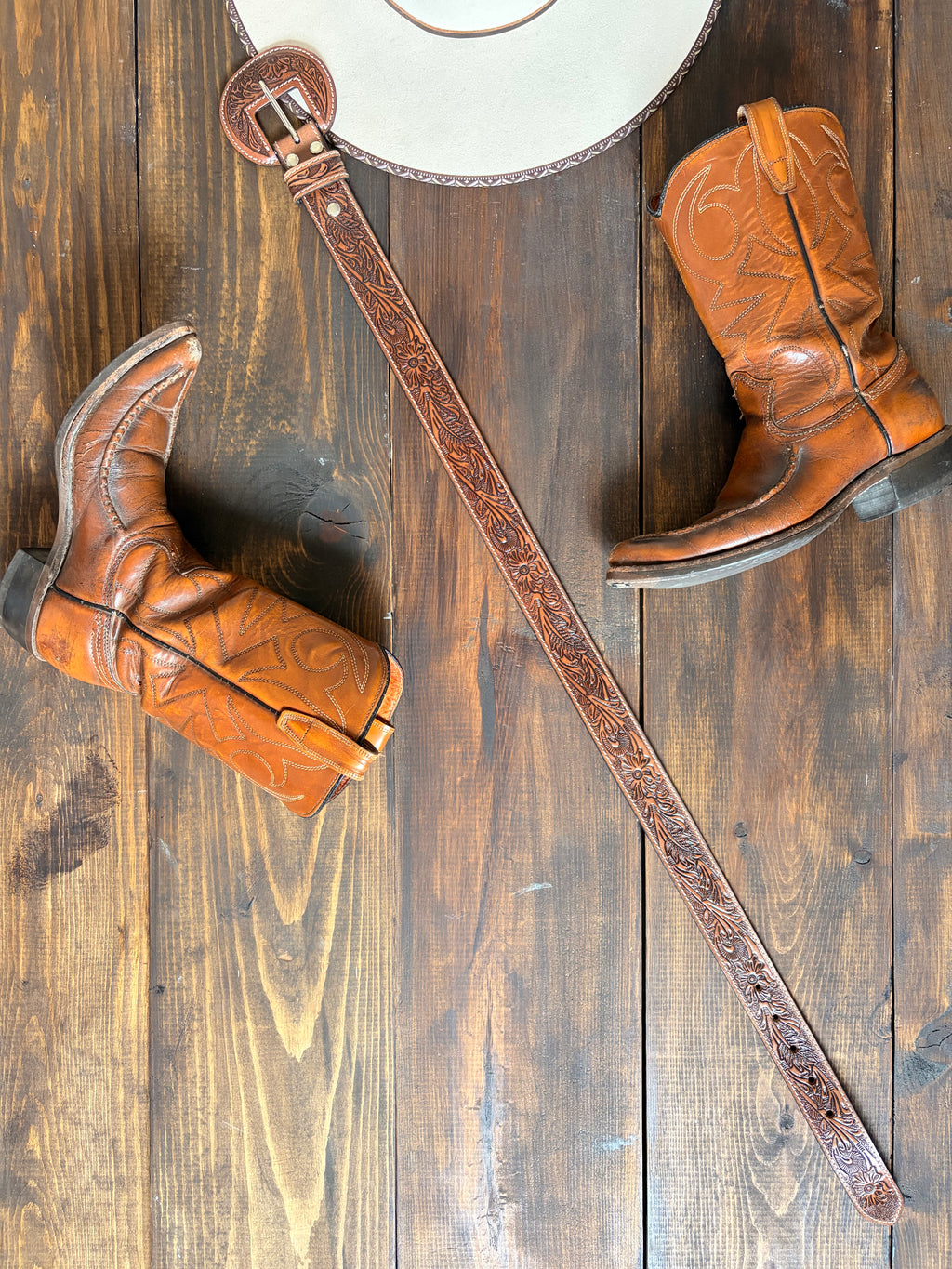 The saddle ridge tooled leather belt