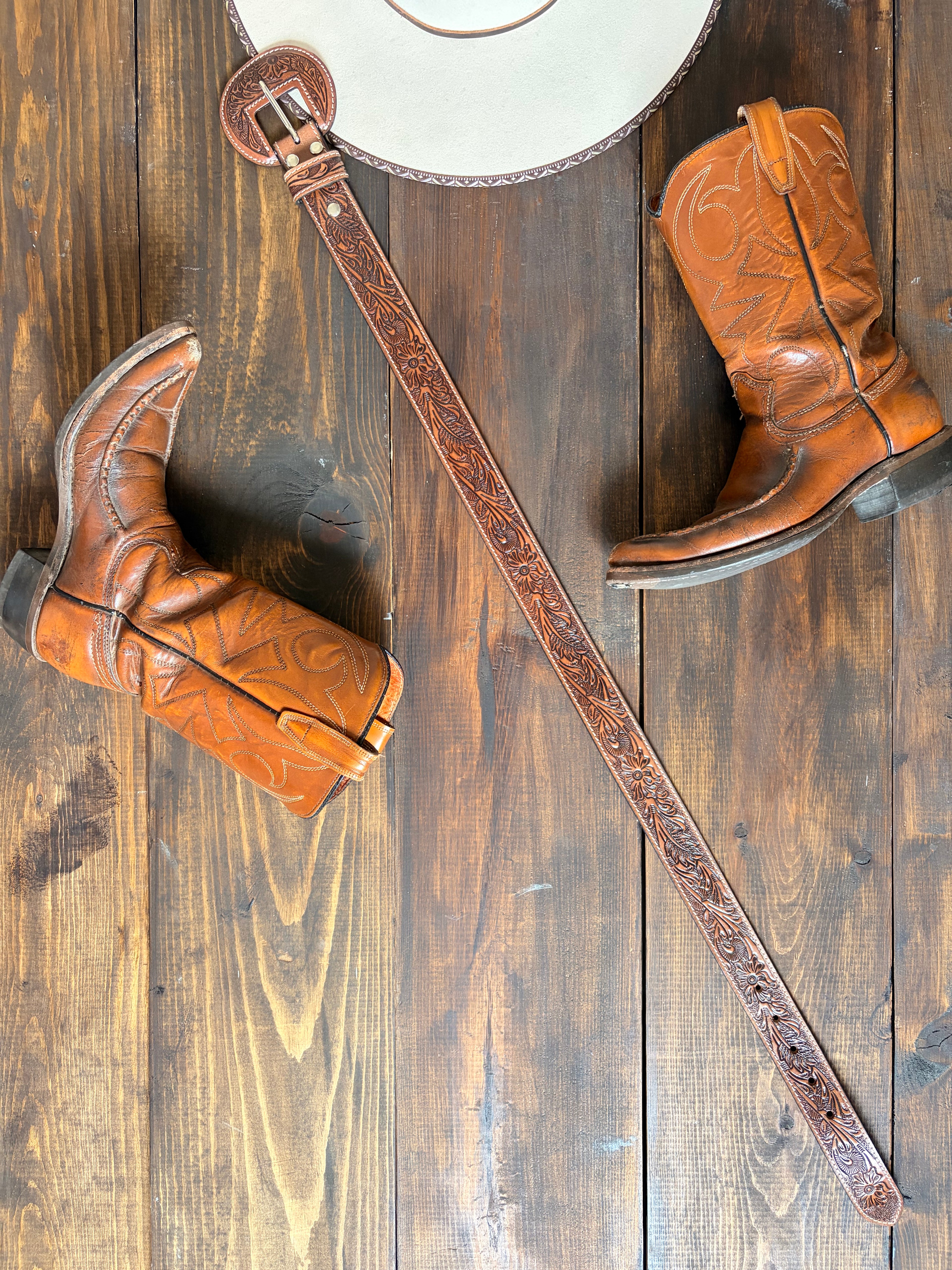 The saddle ridge tooled leather belt