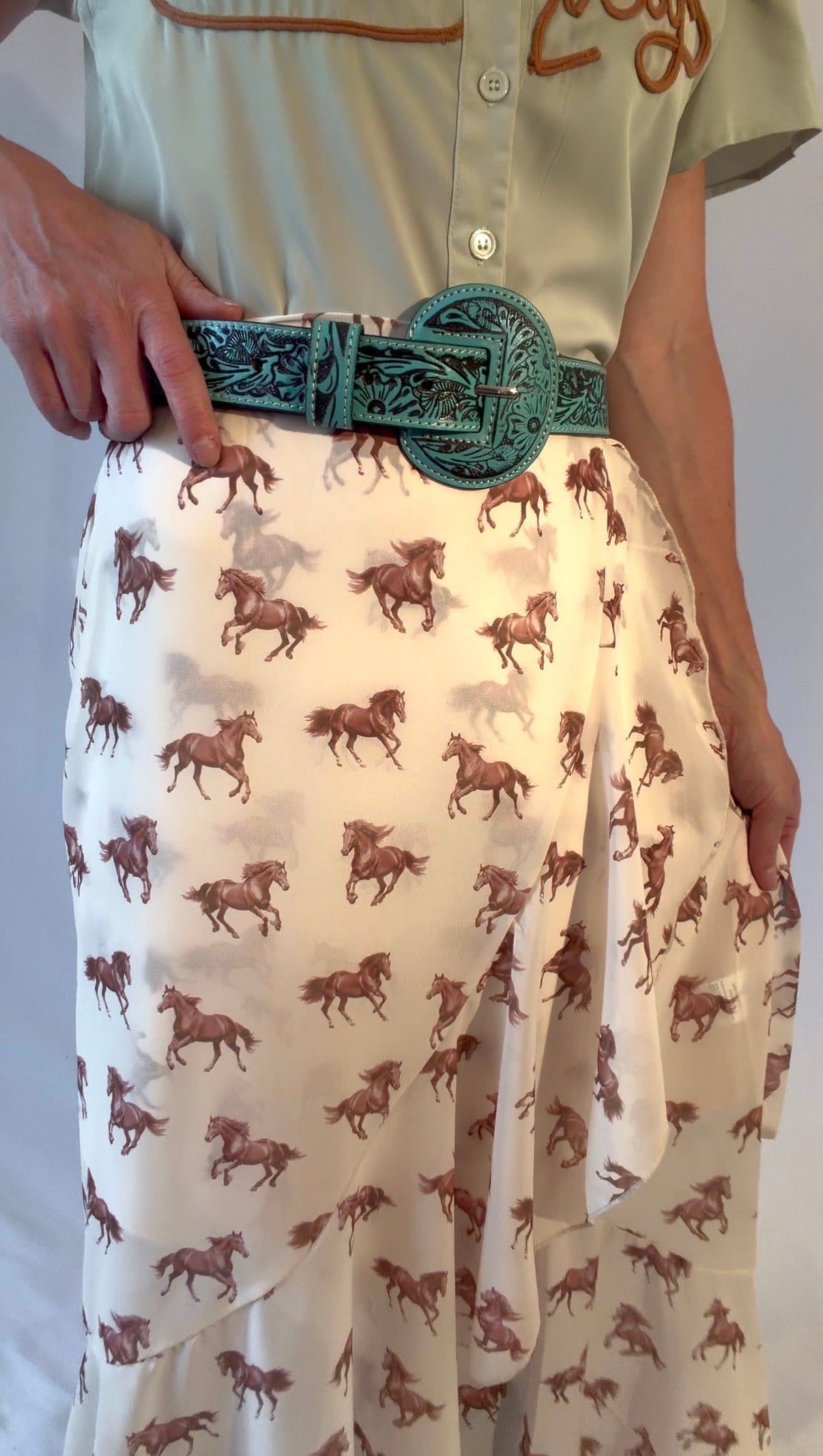 The saddle ridge tooled leather belt