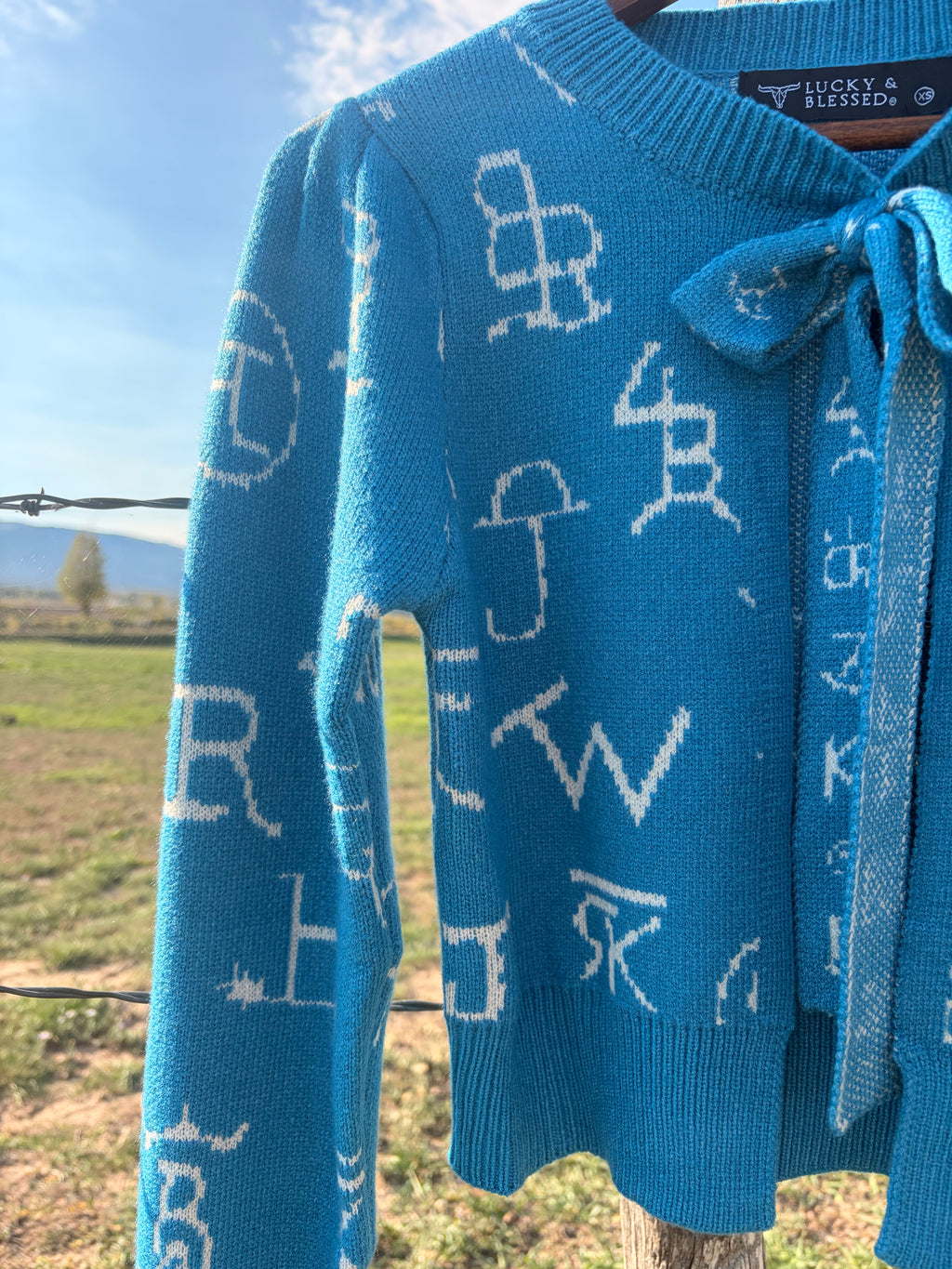 The cattle brand knit cardigan