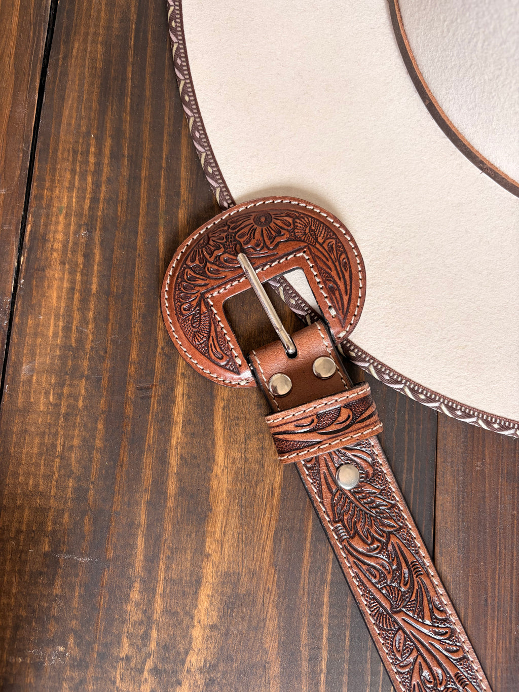 The saddle ridge tooled leather belt