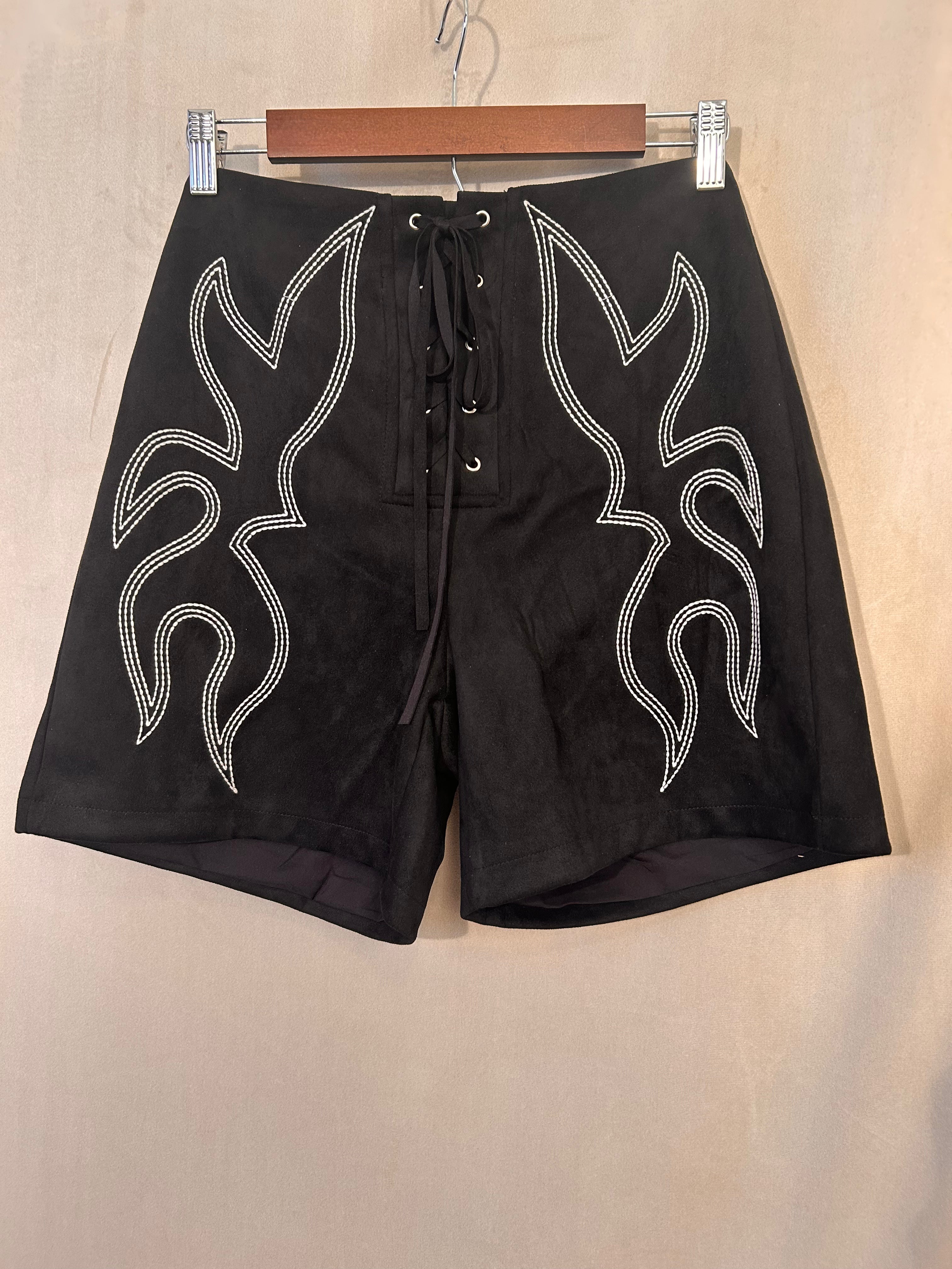 Boots and lace shorts